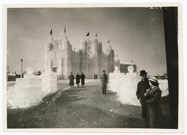 Black and white photograph of the 1937 Winter Carnival Ice Palace, looking west toward State Office Building.