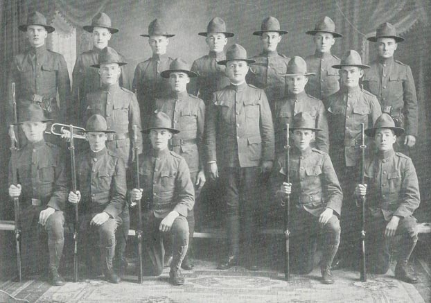 Black and white photograph of corporals in military drill squad, 1918. 