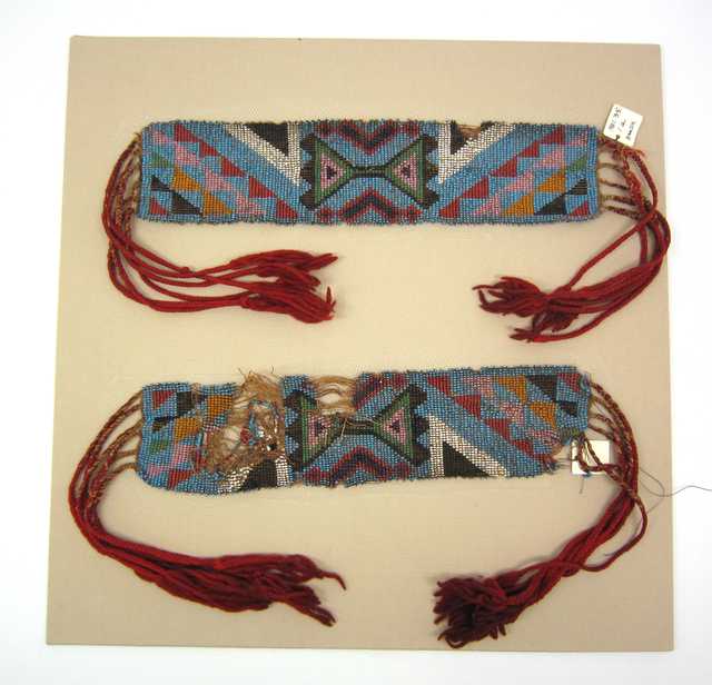 Color image of loom woven garters that originated in the area around Selkirk, Manitoba, and are possibly Ojibwe, Métis, or Cree, ca. 1820s.