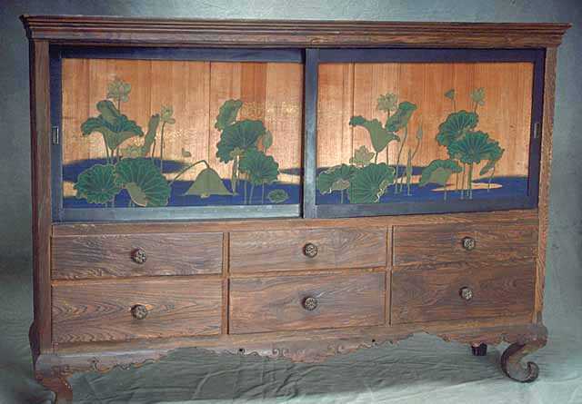 Arts and Crafts cypress cabinet designed by John Scott Bradstreet in 1904.