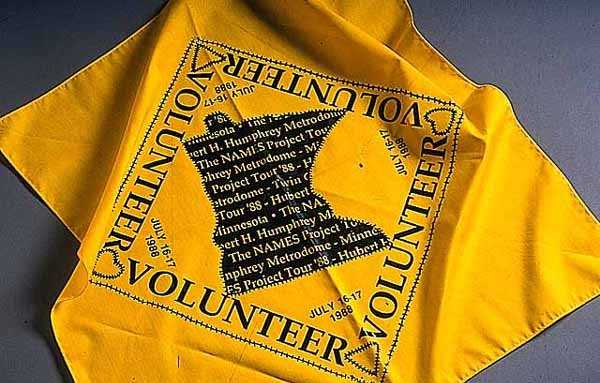 Color image of a Cotton bandana given to volunteers when the AIDS quilt was shown at the Metrodome, 1988.