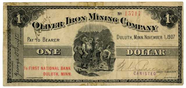Oliver Mining Company $1.00 scrip note. This note was used as currency in the communities near the mines that OMC operated. The bill features an image of miners working in a mine, and the bill was issued in the Canisteo District in 1907.