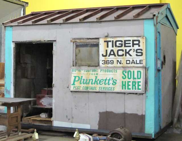 Color image of Store specializing in “do-it-yourself products” owned by Tiger Jack Rosenbloom, 2002. The structure stood at the corner of Dale Street and St. Anthony Avenue in the Rondo neighborhood of St. Paul between 1949 and 2002.