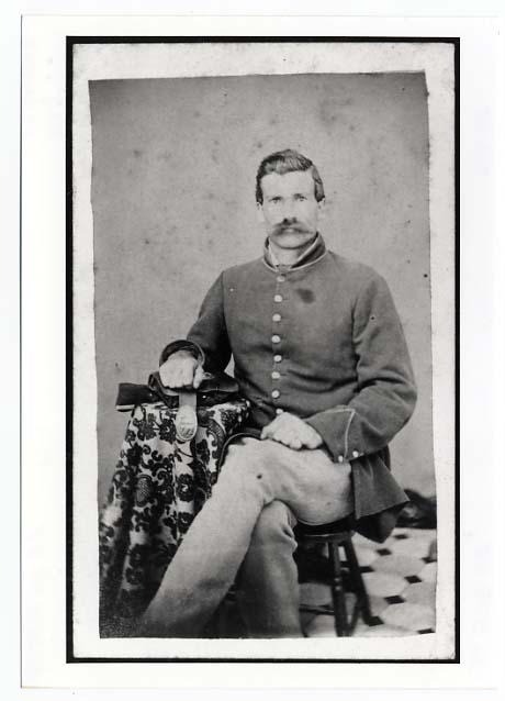 Black and white Carte-de-visite of Archibald Calquhoun, Private, Eleventh Minnesota Infantry Regiment, Company D., taken in 1864 or 1865.