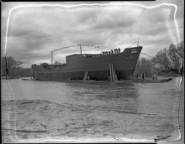 Black and white photograph of the launching of the Agawam at Savage, 1943. Photograph by Minneapolis Star Journal.