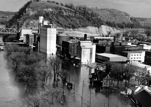 Black and white photograph of The record Mississippi River flood at Red Wing, 1965.