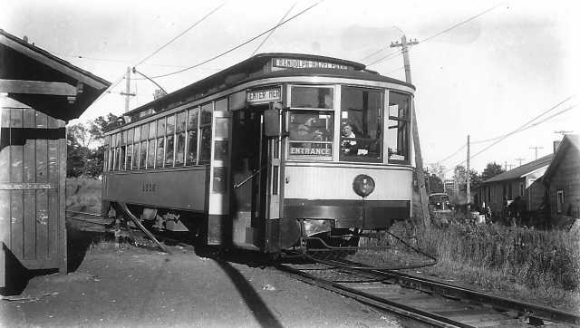 photograph of a streetcar at a station