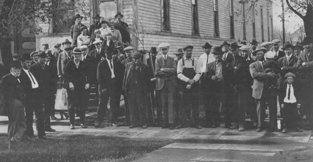 Black and white photograph of locals attending a meeting at the Northwest Experiment Station.  
