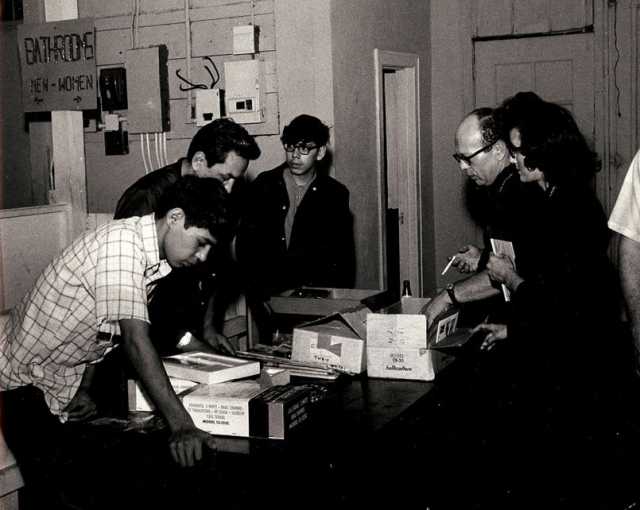 Black and white photograph of AIM Patrol receiving donations, 1968.