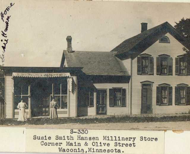 Black and white photograph of Susie Schmitt Hanson's  millinery store, on the corner Main and Olive in Waconia.
