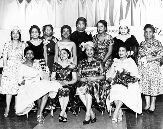 Black and white photograph of the senior usher board, St. Peter’s AME Church, Minneapolis, ca. 1960. 