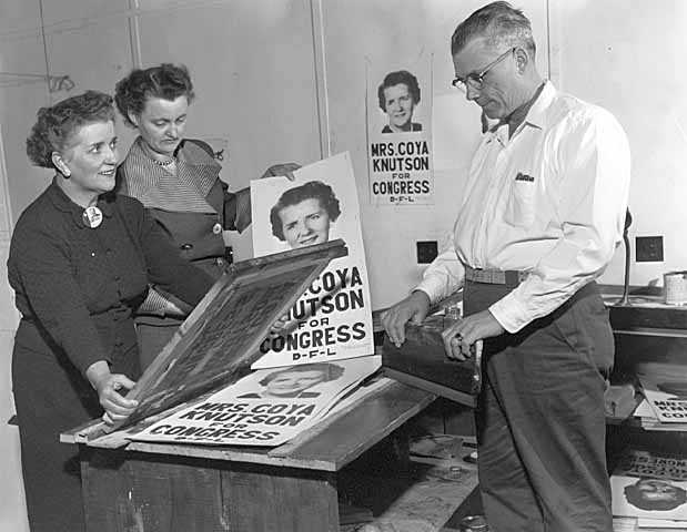Photograph of Coya Knutson with campaign posters