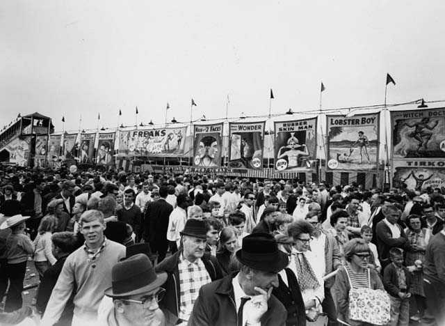 Black and white photograph of crowds at the Midway, Minnesota State Fair, 1963, 