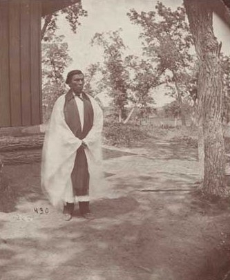 Black and white photograph of Enmegahbowh (Reverend John Johnson), c.1885.