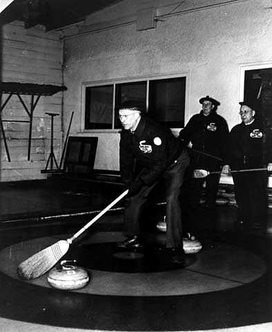 Action shot at the St. Paul Curling Club