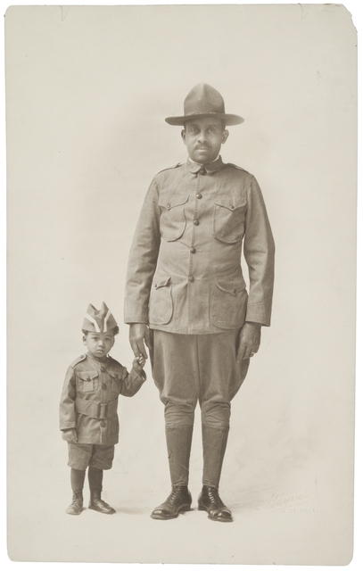 Black and white photograph of Dr. O.D. Howard Sergeant in the Sixteenth Battalion of the Minnesota Home Guard and his grandson, Howard Maxwell, 1918. 