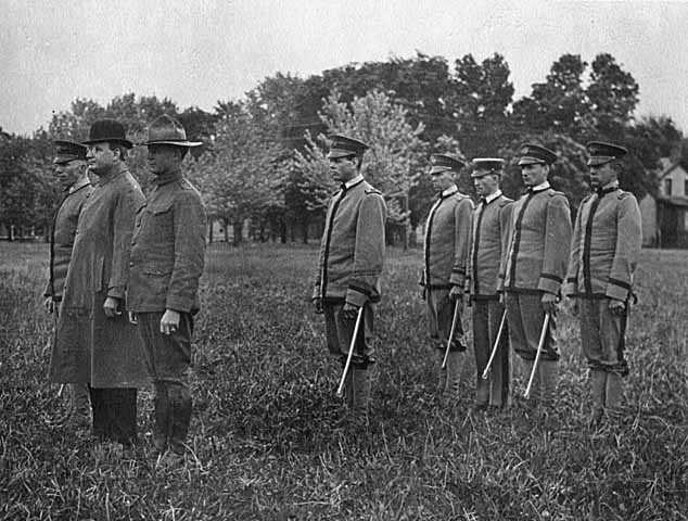 Black and white photograph of Governor Joseph A. A. Burnquist with a military group, c.1916.