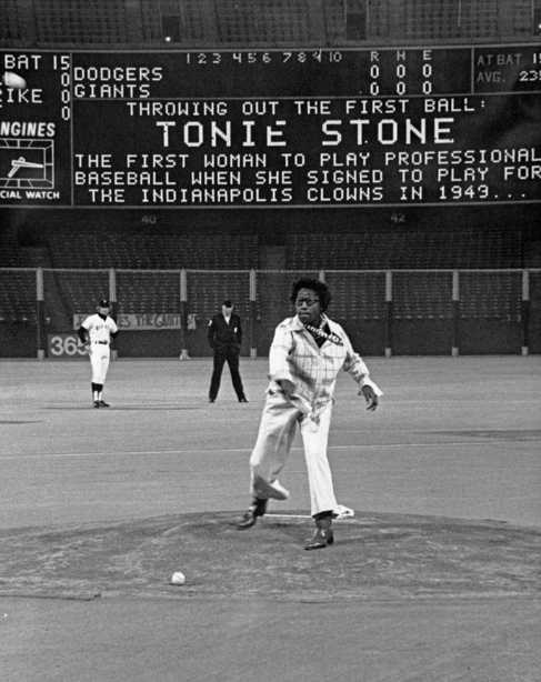 Black and white photograph of Toni Stone throwing out the first ball at a game in San Francisco, c.1965.
