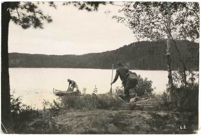 Canoers completing a portage in the Superior National Forest