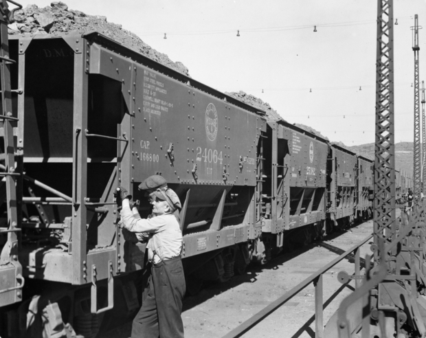 Black and white photograph of ore cars being unloaded at Dock 6 in Duluth, 1935.