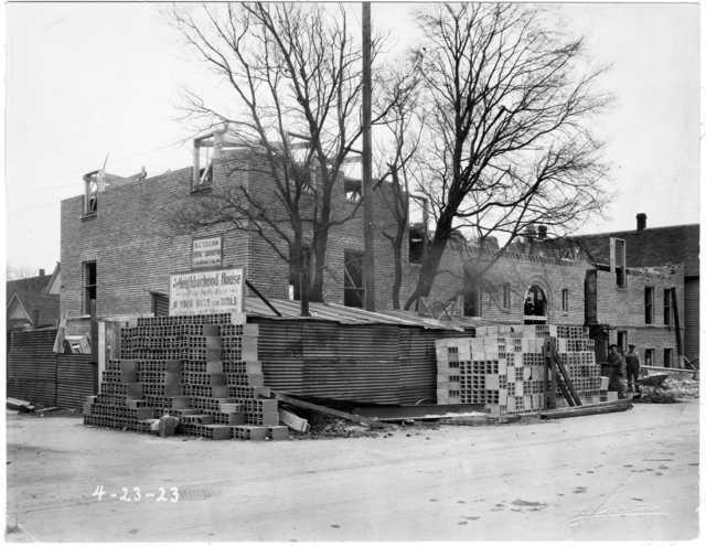 Black and white photograph of the construction site of St. Paul’s Neighborhood House, April 23, 1923.