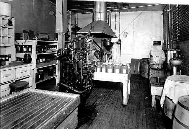 Black and white photograph of Bottling machinery at the M. A. Gedney Company, c.1912.