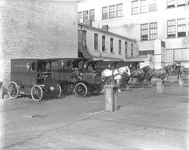 Black and white photograph of L. S. Donaldson delivery wagons, 1911. Photograph by C.J. Hibbard. 
