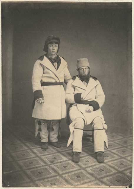 Black and white photograph of dog team drivers, Tarbell and Campbell, from Pembina, 1856. 