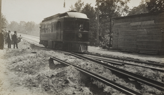 Black and white photograph of cars on the Dan Patch line, 1910. 