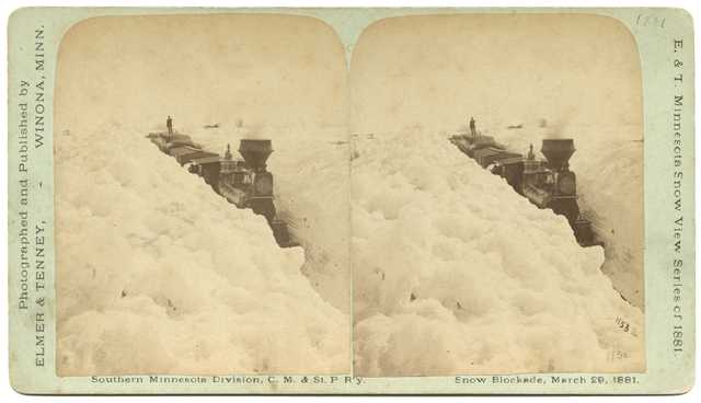 Black and white photograph of a snow blockade, Southern Minnesota Division, Chicago, Milwaukee and St. Paul Railway, March 29, 1881.