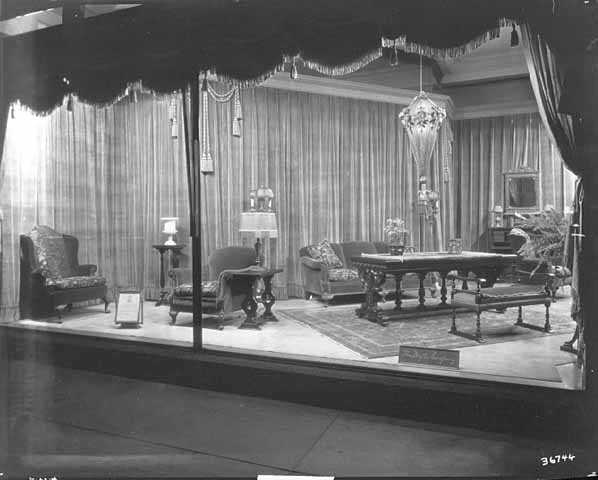 Black and white photograph of furniture window display, c.1920.  