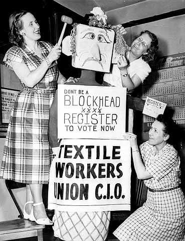Textile Workers Union of the Congress of Industrial Organizations urging members to register to vote Photograph by Lee & Palmer, 1948.