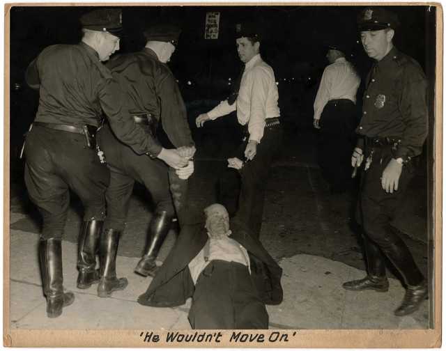 Police dragging a striking worker
