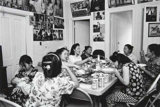 Black and white photograph of a Hmong Celebration, Frogtown, 1993. Photograph by Wing Young Huie.