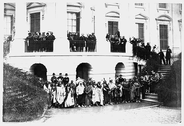 American Indian delegation in Washington, D.C.; Bagone-giizhig is standing on the balcony, to right of second pillar from the left