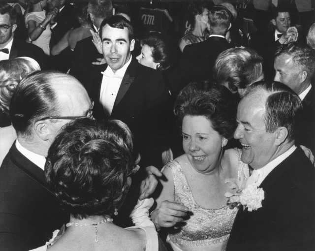 Black and white photograph of Vice-President Hubert Humphrey dancing with WAMSO President Dorothy Gauther at the 1966 Symphony Ball.