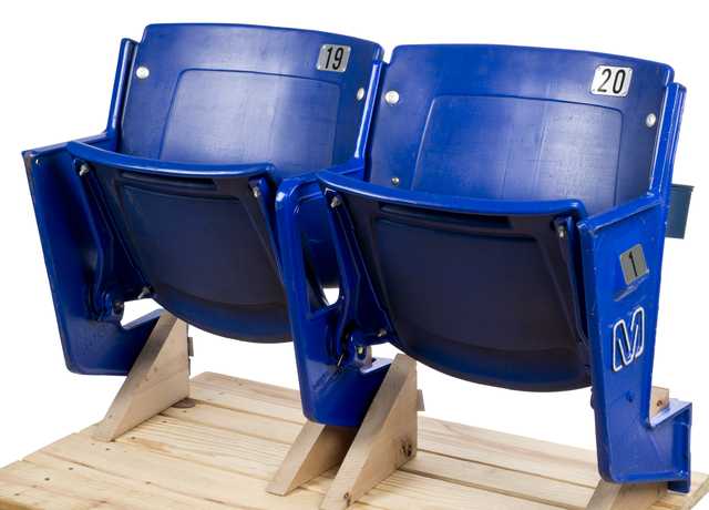 Color image of a pair of Metrodome row seats, in use from 1982–2013.