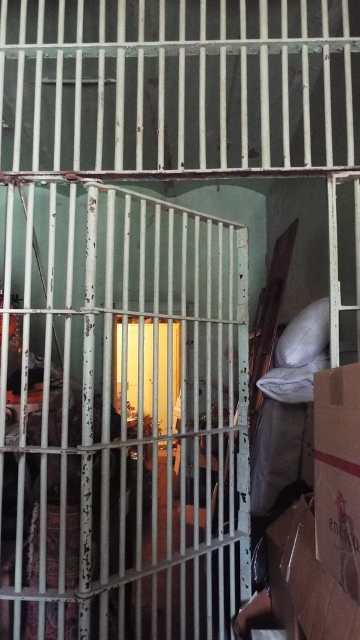 Color image of a jail cell in Crookston city hall, November 2016.