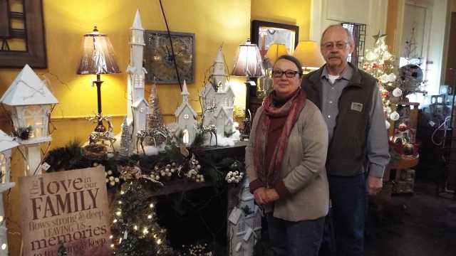 Color image of the owners of gift shop in old Crookston city hall, December 2016.