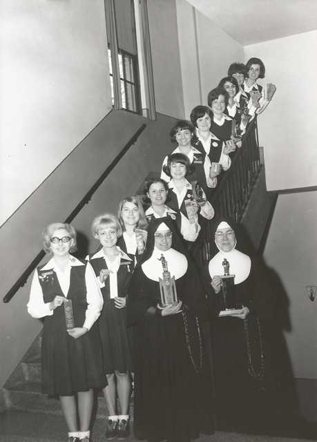 Black and white photograph of the debate team of St. Joseph’s Academy in the late 1960s.
