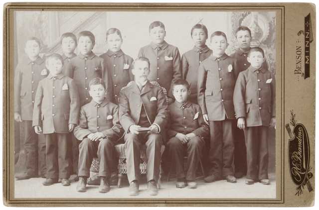 Teacher and students, Morris Indian School, ca. 1895. Included are B. LeVivash, Joe Northrup, and Joe Siehy. Photograph by R. E. Brandmo.