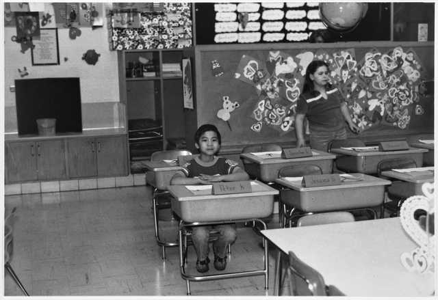 Pitaro (Peter) Khouth, a Cambodian Minnesotan, in his classroom at Centennial School in Richfield, ca. 1980.