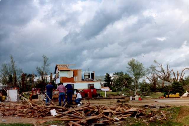 Survivors of the Chandler–Lake Wilson Tornado inspect damaged property in the aftermath of the storm, June 1992.