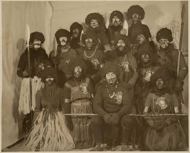 Participants in the 1916 St. Paul Winter carnival pose in their "Africa costumes."