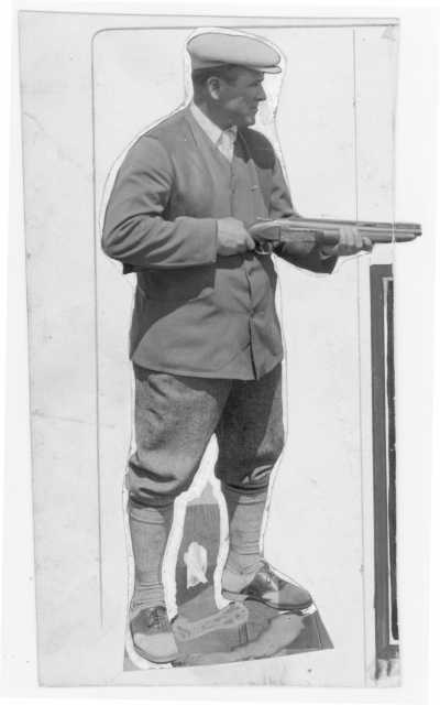Wilford "Captain Billy" Fawcett with a trapshooting shotgun. Fawcett captained the U.S. trapshooting team at the 1924 Olympics