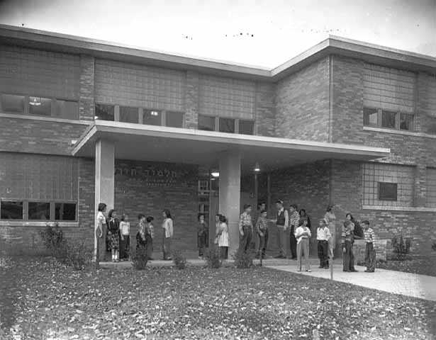 Black and white photograph of the exterior of the Minneapolis Talmud Torah at 1616 Queen Avenue North in Minneapolis, 1951. Photograph by the Minneapolis Star Journal Tribune.