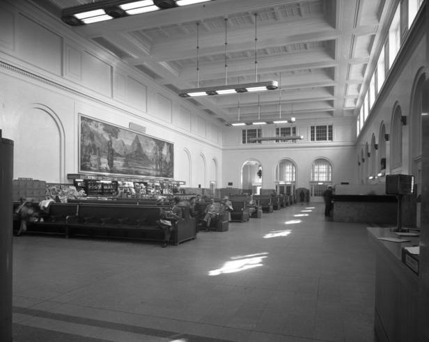 Black and white photograph of the interior of the Minneapolis Great Northern Depot waiting room, 1950.  