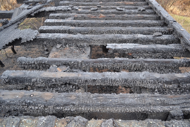 Detail of the Minnesota and International Railway trestle bridge after the April 2015 fire