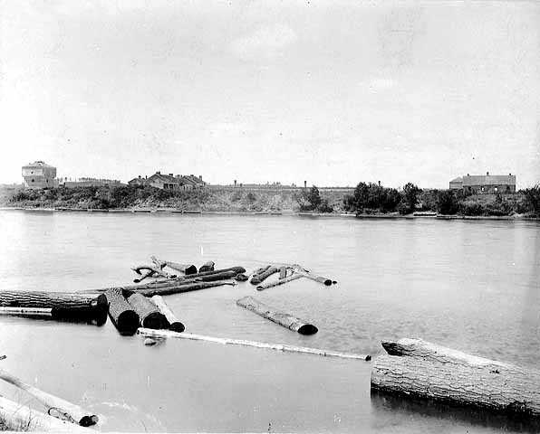 Black and white photograph of abandoned Fort Ripley as seen from the east side of the Mississippi River, c.1895.