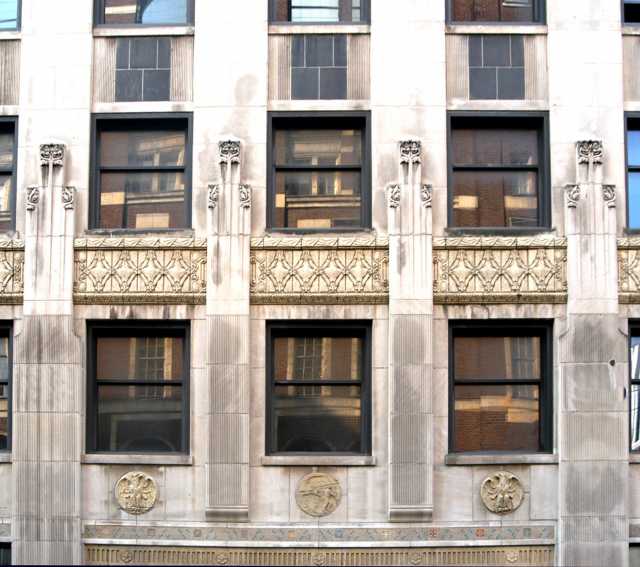 Color image of thefacade of the Minnesota Building above the main entrance, 2009.